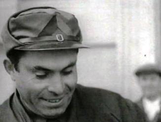 Durruti head shot with cap